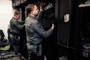 San Joaquin County Sheriff's SWAT Team putting away gear in lockers